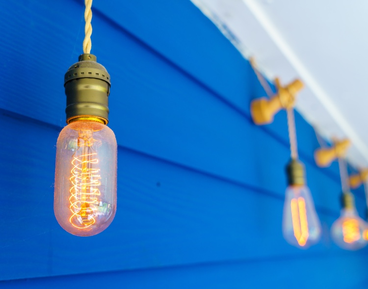 light bulbs against a blue background